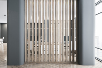 Slatted dark wooden wall with two black columns on the sides in modern eco style office room. 3D rendering.