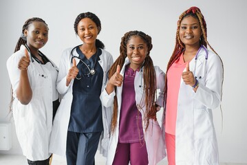 group of young african medical workers on white background