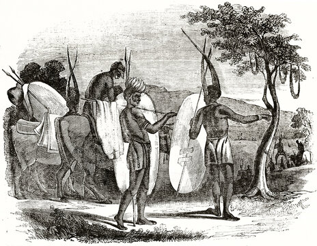 Cafres family migrating, horseback and on foot indigenous people equipped with tribal spears and shields. Ancient grey tone etching style art by unidentified author, Magasin Pittoresque, 1838