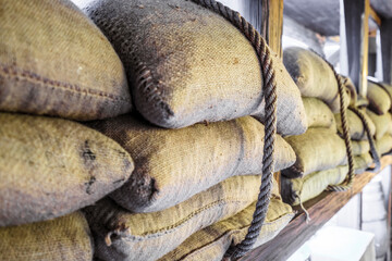 Coffee beans packed in sackcloth bags for transportation