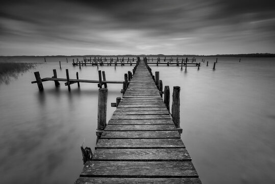 Wooden Pier Over Sea Against Sky © stephan naumann/EyeEm