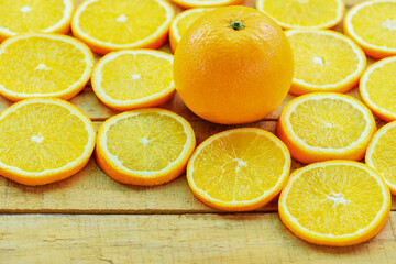 Orange slice on wooden background and fresh orange fruit , healthy fruits concept.