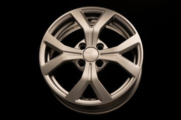 new grey silver alloy wheel on black background