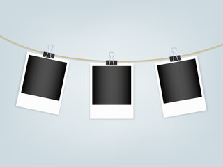 Retro photo frames hanging on rope with paper clips. White textured border. Vector illustration, flat design