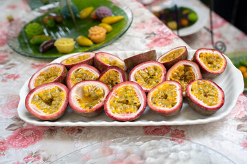 the Half of Passion Fruit on the dish, ready to serve and eat.