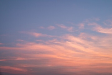 Naklejka na ściany i meble Pink and orange sky in twilight time for background.