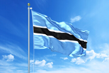 Botswana flag waving on a high quality blue cloudy sky, 3d illustration