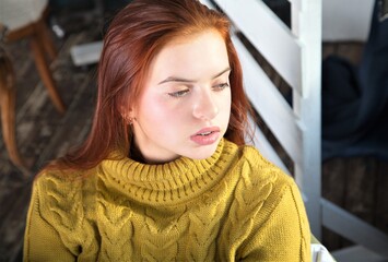 portrait of a girl. Person young with red hair