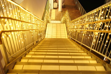 Obraz premium Stairway with Abstract lights. Defocused Glowing light bulb, copy space