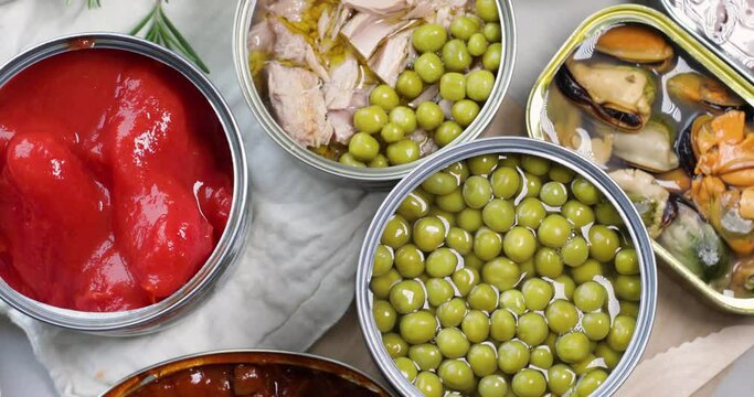 Various canned vegetables, fish and peas