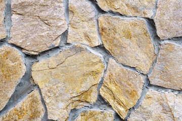 brown stone texture background abstraction. building wall. Close up