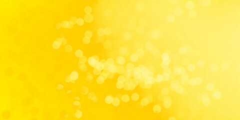 Abstract blur image bright of the yellow bokeh for background usage.
