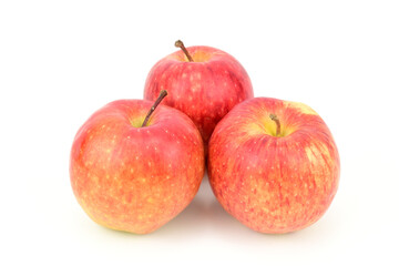 Three red ripe apples isolated on white background