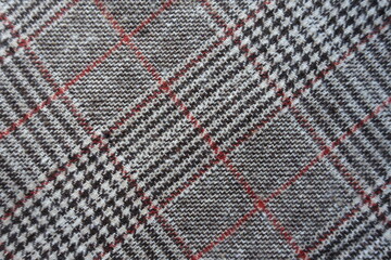 Background - gray and red Glen check fabric from above