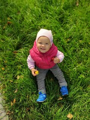 little child in the grass