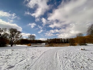 Fototapeta na wymiar A snow covered field in Spijkenisse, dutch winter in The Netherlands