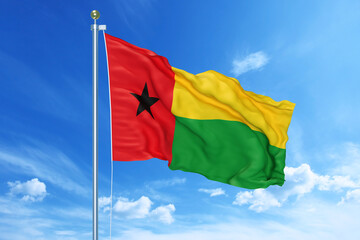 Guinea-Bissau flag waving on a high quality blue cloudy sky, 3d illustration