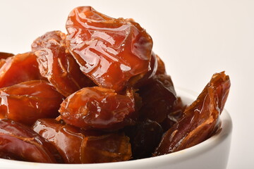 dates fruit , famous for it in the regions of [Al-Qatif, Al-Qassim, Al-Kharj and Al-Hasa] in Saudi Arabia. It is characterized by preserving its good flavor after a long period of storage.