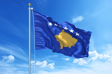Kosovo flag waving on a high quality blue cloudy sky, 3d illustration