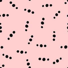 Seamless pattern with scattered round spots. Simple cute print. Vector illustration.