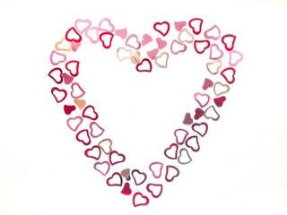 Many small beautiful shiny hearts forms big heart on white background. Lovely valentine day, 14th...
