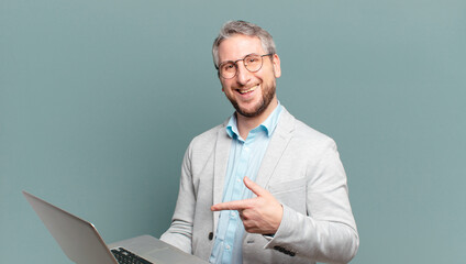 middle age businessman with a laptop