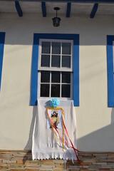 window with a religious flag