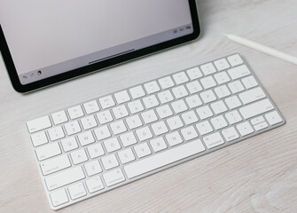 laptop on a wooden table