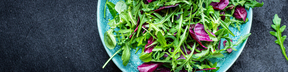 salad lettuce leaves vegetables mix greens portion on the table healthy meal snack outdoor top view copy space for text food background rustic image