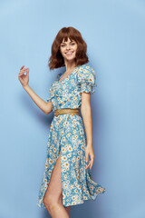 Woman in flower Cheerful smile hand gesture blue background dress 