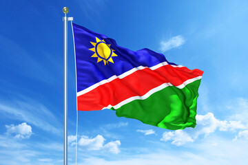 Namibia flag waving on a high quality blue cloudy sky, 3d illustration