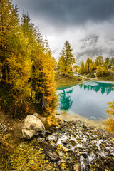 Obraz premium autumn mood over alpine lake in Valais