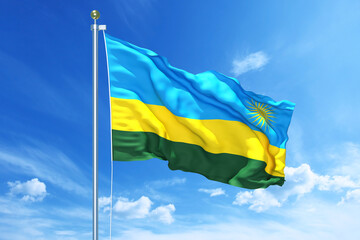 Rwanda flag waving on a high quality blue cloudy sky, 3d illustration