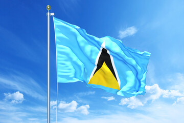 Saint Lucia flag waving on a high quality blue cloudy sky, 3d illustration