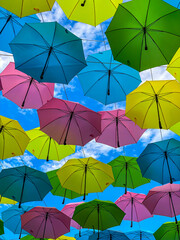 Fototapeta na wymiar Colorful Umbrellas inn the sky