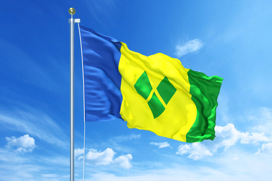 Saint Vincent and the Grenadinesflag waving on a high quality blue cloudy sky, 3d illustration