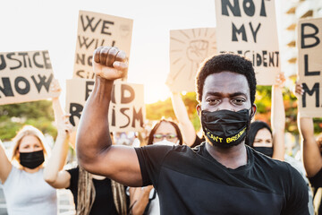 Black lives matter activist movement protesting against racism and fighting for equality -...