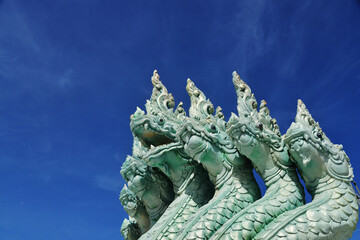 Multi Head Naka Statue Under Blue Sky