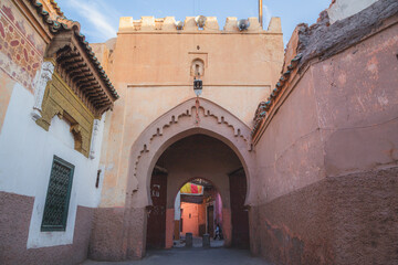 An historic arch gate in the old town medina of Marrakech, Morocco.