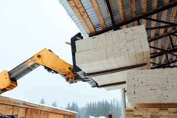 forklift truck with planks, delivery of wood to the warehouse, loading a large number of wooden planks with the help of industrial transport