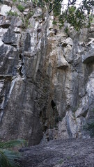 Fototapeta na wymiar a rock wall on one of the Marble Mountains, Ngu Hanh Son South Da Nang, Vietnam, February