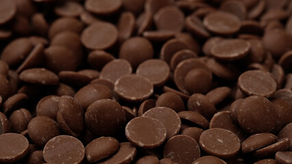 milk chocolate chips close up. confectionery concept