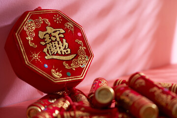   Chinese new year  Firecracker On Red Background (Chinese characters translated  in the article...