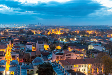 Fototapeta na wymiar Sehzade Mosque and Istanbul Metropolitan Municipality night view from Suleymaniye Mosque in Istanbul
