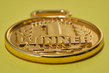 close up of golden medal
