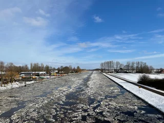 Fotobehang Ice in the Prinses Margriet canal © TravelTelly