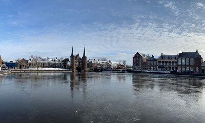 Fototapeta na wymiar Panorama from the waterpoort during winter in Sneek