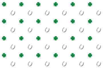 background of symbols of luck - horseshoe and green clover - 412225870