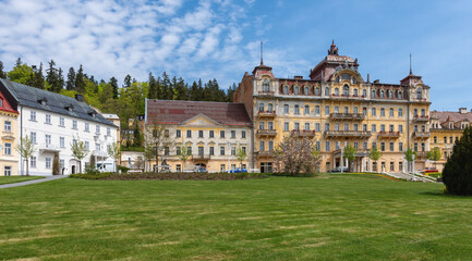 Fototapeta na wymiar Goethe Square in spring time with building of city museum and spa house Kavkaz - spa center of Marianske Lazne (Marienbad) - Czech Republic