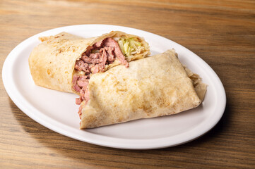 Roast tacos with corn tortillas. Mexican tacos. traditional mexican food concept on wooden table.